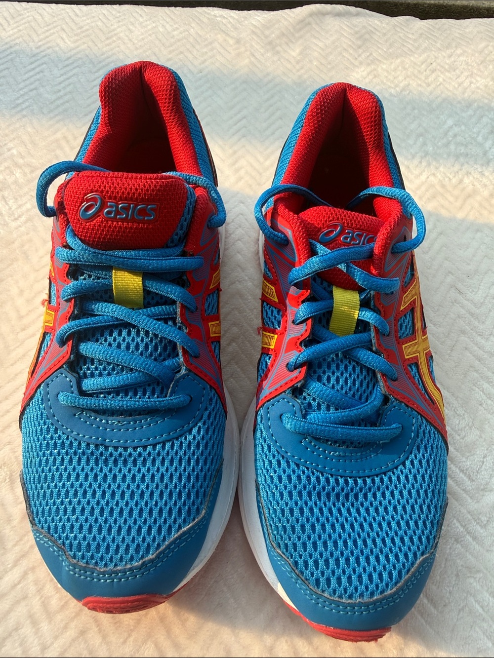 ASICS Kids Blue, Red and Yellow Athletic Sneakers. Size 5